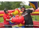Boxing Ring with Giant Gloves bounce house rental in Houston — interactive inflatable with oversized boxing gloves