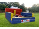Red and yellow interactive obstacle course rental in Austin, ideal for kids and adults ages 5 and up at backyard parties.