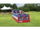 Red and blue bungee run interactive rental in Austin with padded obstacles, ideal for teenagers and adults competing in Round