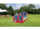 Dual-player red, white, and blue bungee run obstacle course rental in Dallas, perfect for teenage and adult competitions