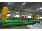 Perfect for Houston school events, this inflatable bungee football tug-of-war rental features bungee vests and basketball hoops