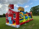 Perfect for Kyle birthday parties, this school-themed obstacle course rental in Austin features a schoolhouse and bus design