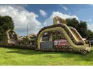 Dallas camo obstacle party rental with climbing challenges and slides for McKinney outdoor celebrations.