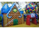 Gingerbread house bounce house rental in Houston with ball pit—ideal for toddler parties in Spring.