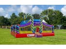 Colorful toddler bounce house rental in Austin with spiral towers and candy-themed design, ideal for Cedar Park birthday parties.