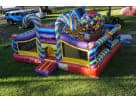 Toddler Candy Playland obstacle course rental in Dallas with colorful striped towers and ball pit, perfect for Mesquite events.