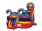 Perfect for Dallas kids' parties, this colorful candy-themed bounce house rental features dual slides and dual access for ages