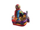 Colorful candy-themed bounce house rental in Austin with red, blue, yellow, and purple panels, ideal for kids' parties