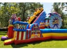 Perfect for Austin parties, this carnival-themed obstacle course rental features a kid-friendly rock wall and multiple slides