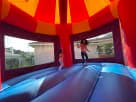 Toy Story carousel bounce house rental in Houston keeps Pearland kids entertained for hours.