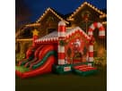 Christmas Candy Cane dual-slide bounce house rental in Austin, ideal for Buda holiday parties with kids of all ages.