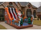 Tobogán de 20ft con tema navideño Santa Claus disponible para renta en Dallas — perfecto para eventos en Plano.
