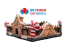 Gingerbread Wonder Playland bounce house rental in Dallas with indoor slide and popup features, ideal for Irving holiday parties.