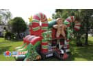 Christmas gingerbread bounce house rental in Austin with candy cane details, perfect for Georgetown holiday parties and family