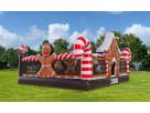 Perfect for Dallas holiday parties, this gingerbread-themed bounce house rental features a slide and interactive popups