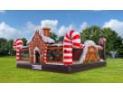 Gingerbread Wonder Playland bounce house rental in Dallas with candy decorations and slide, ideal for Mesquite holiday events.