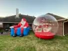 Giant Santa Chair rental in Houston with photo booth setup — ideal for League City holiday parties.