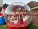 Christmas inflatable snow globe rental in Dallas with LED lights, ideal for Fort Worth holiday parties and festive backyard