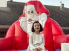 Perfect for Houston holiday parties, this giant inflatable Santa chair rental features a photo-op design ideal for guest
