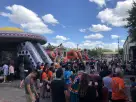 UFO Spaceship bounce house rental in Dallas with slide, holds up to 6 kids—ideal for Garland events and large parties.