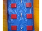 Perfect for Dallas birthday parties, this blue bounce house rental features a rock climbing wall, slide, and spacious jumping