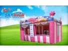 Pink and white striped carnival treat shop rental with dual serving windows, ideal for Austin event parties and concessions.