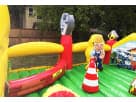 8-kid construction-themed obstacle course rental in Austin with climb, slide, and inflatable weave elements, ideal for toddler