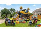 Construction-themed bounce house combo with dual slides available for rental in Austin, perfect for kids' parties in Round Rock.
