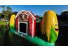 Corn-themed bouncer combo rental in Austin showcases a giant ear design, perfect for Cedar Park celebrations.