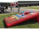 Perfect for Houston team building events, this giant inflatable cornhole rental features a spacious 5x8 ft size