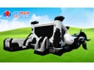 Cow-themed bounce house with slide rental in Austin—ideal for Buda birthday parties and events.