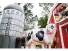 Perfect for Dallas toddler birthday parties, this Farmyard obstacle course rental features farm animals and a tractor slide