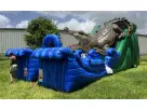 King Croc wet and dry slide rental in Austin with digitally printed crocodile design, ideal for Pflugerville backyard parties.