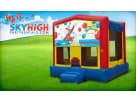 Curious George 15x15 bounce house rental in Austin with mesh safety enclosure, ideal for Leander birthday parties.