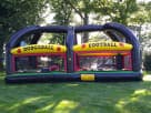 Renta de brincolín deportivo All in One Sports en Dallas con 8 juegos, ideal para fiestas en Lewisville.