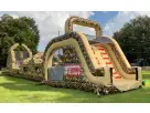 100ft military obstacle course rental in Dallas with dual slides and serpent tunnel, ideal for Grand Prairie team building events.