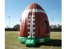 Football bounce house moonwalk rental in Austin with stadium-style field setting, holds up to 5 kids, ideal for Cedar Park events.
