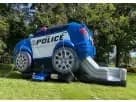 Dallas police bounce house rental combo with attached slide for Irving backyard party entertainment.