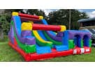 Renta de brincolín Retro Radical con tobogán de pared en Dallas — inflable colorido ideal para fiestas en Fort Worth.