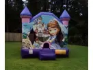 Sofia the First bounce house rental in Dallas with castle design, ideal for kids 3 and up at Frisco birthday parties.