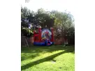 Spider-Man bounce house rental in Dallas with wet or dry slide, ideal for Mesquite birthday parties.