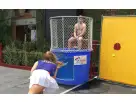 Interactive dunk tank rental in Austin with mesh cage seat, perfect for Georgetown events and corporate team building.