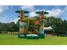 Dinosaur bounce house rental in Dallas with 3D realistic artwork, holds 5-7 kids—perfect for Arlington backyard parties.