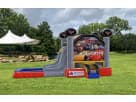 Perfect for Austin birthday parties, this Cars bounce house rental features dual slides ideal for kids' summer fun.