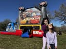 Cars bounce house rental in Austin with dual water slides, ideal for San Marcos birthday parties.