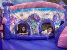 Disney Princess toddler bounce house rental in Dallas with dual play tunnels, ideal for ages 2-6 at Grand Prairie parties.