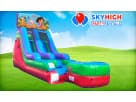 Dora the Explorer wet and dry water slide rental in Houston with 15ft height, set up in a grassy park ideal for Spring parties.