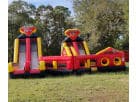 Superman-themed Double Rush obstacle course rental in Austin with dual slides, perfect for Buda birthday parties and events.