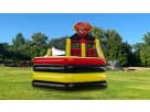 Red, yellow, and black Double Rider bounce house rental in Houston—ideal for League City parties with thrilling obstacle course fun.