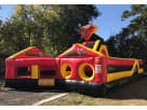 Perfect for League City birthday parties, this red and yellow obstacle course rental in Houston features dual slides